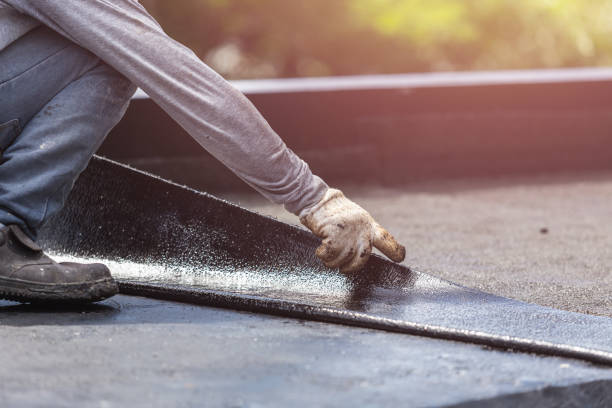 Professional Basement Waterproofing technician working in Pine Beach, NJ